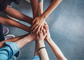 Group of hands showing teamwork